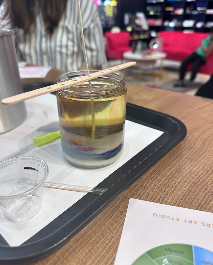 Finished layered custom candle on a tray at Makers Art Studio Pleasanton