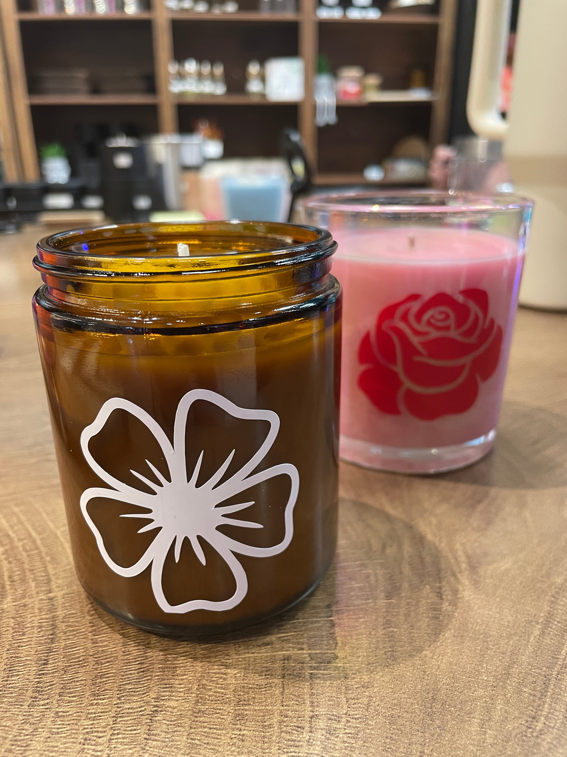 Handmade amber soy candle with floral design at Makers Art Studio Pleasanton